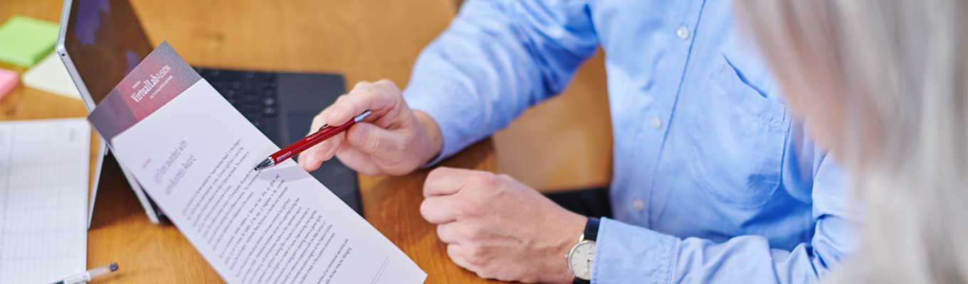 Final inspection of our VirtualLab Fusion product sheets before they go to print.