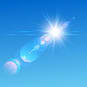 A beam of light that falls through a glass triangle and is scattered in its individual color spectra.